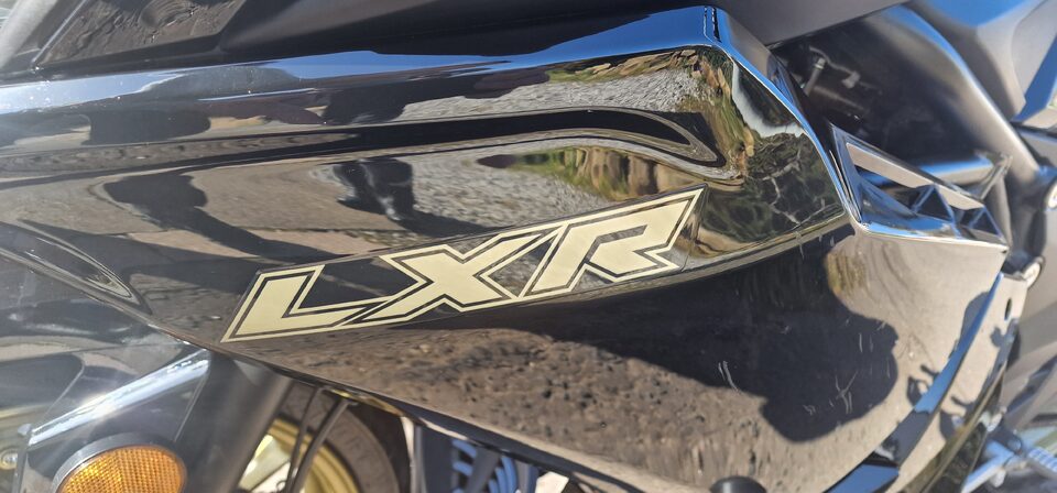 Before LXR Motorbike Gold-to-Pearlescent Graphics Refresh project photo 4 of 7