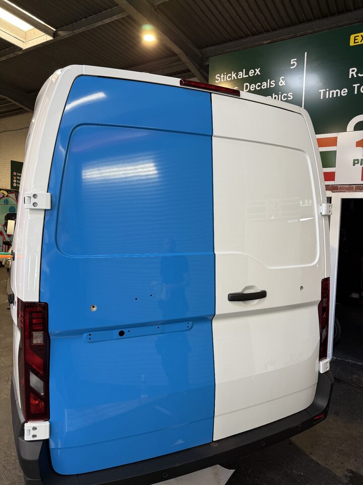 C&M Roofing van before the completed vehicle graphics