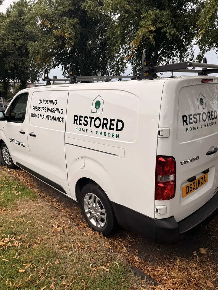 Completed home and garden branding on the opposite side of a white Vauxhall Vivaro van